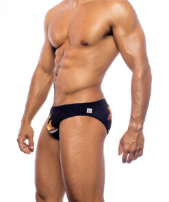 Men's swimwear, briefs style, worn by a man, side view, black color.