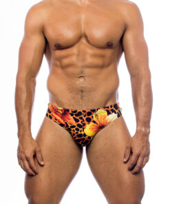 Men's swimwear, briefs style, worn by a man, front view, sauvage pattern